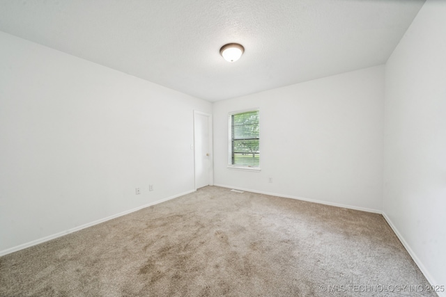 6947 S 30th W Ave, Tulsa, OK 74132 - carpeted spare room with baseboards