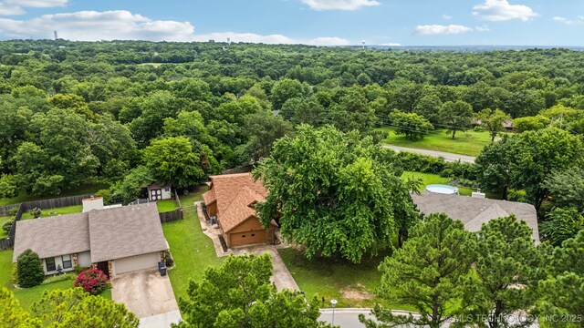 6947 S 30th W Ave, Tulsa, OK 74132 - drone / aerial view of a heavily wooded area