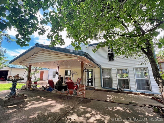 98224 S 4489th Rd, Vian, OK 74962 - rear view of house featuring a patio area
