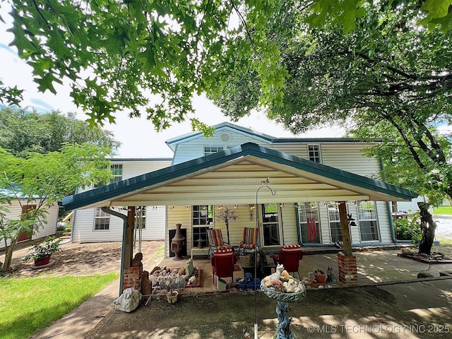 98224 S 4489th Rd, Vian, OK 74962 - view of front of property featuring a carport and covered porch