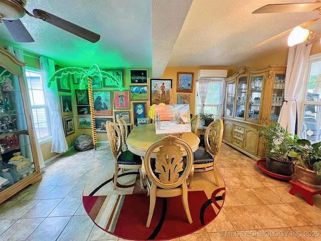 98224 S 4489th Rd, Vian, OK 74962 - dining area featuring a ceiling fan, a textured ceiling, healthy amount of natural light, light tile patterned floors, and an AC wall unit