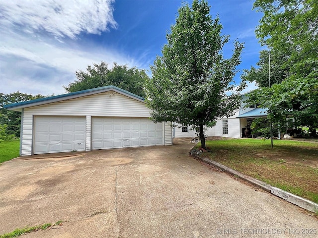 98224 S 4489th Rd, Vian, OK 74962 - view of front facade featuring an outdoor structure and a garage