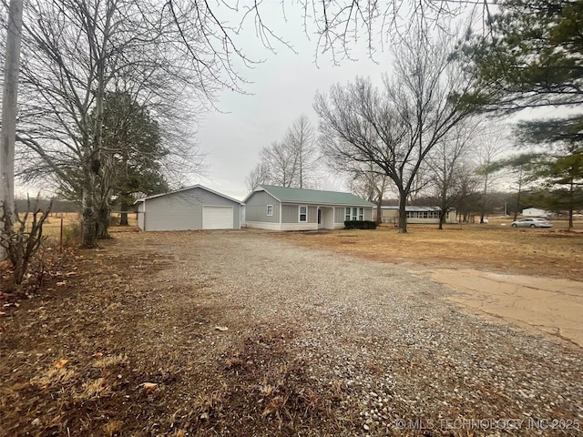 23308 W 171st St, Kellyville, OK 74039 - ranch-style house featuring a detached garage and driveway