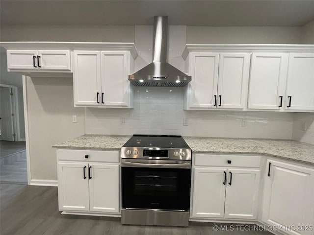 23308 W 171st St, Kellyville, OK 74039 - kitchen with stainless steel range with electric stovetop, wall chimney exhaust hood, white cabinetry, and dark wood-type flooring