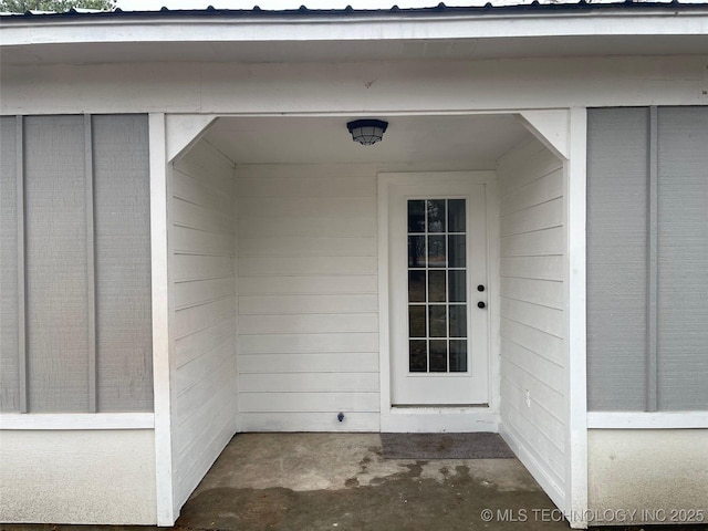 23308 W 171st St, Kellyville, OK 74039 - view of exterior entry featuring board and batten siding