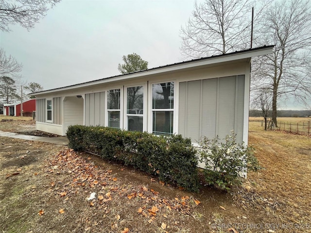 23308 W 171st St, Kellyville, OK 74039 - view of side of home with board and batten siding