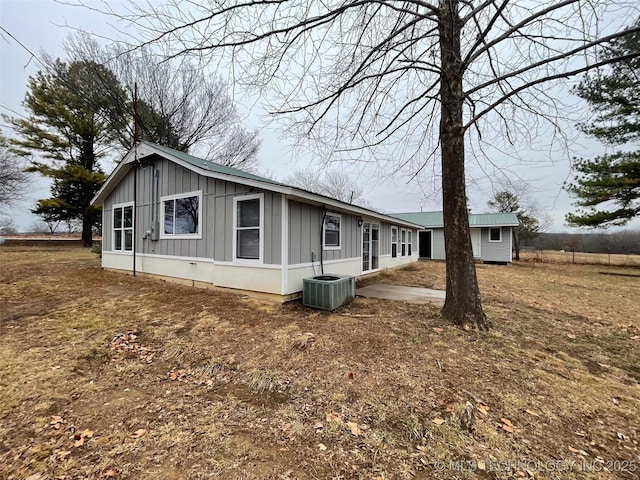 23308 W 171st St, Kellyville, OK 74039 - view of home's exterior featuring board and batten siding and a central AC unit