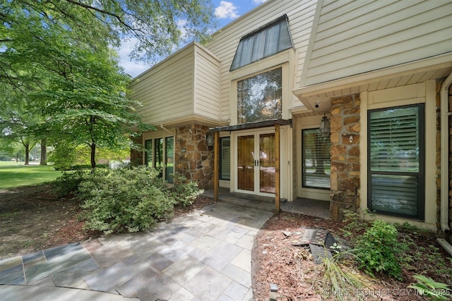10958 S Richmond Ave, Tulsa, OK 74137 - entrance to property with stone siding and french doors