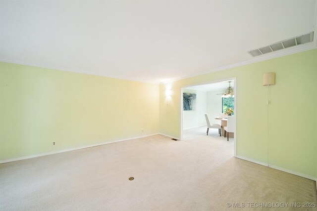10958 S Richmond Ave, Tulsa, OK 74137 - empty room with ornamental molding, light carpet, and a chandelier