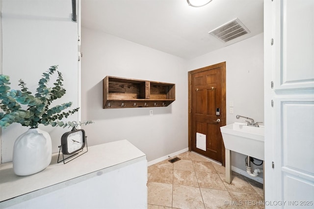 10958 S Richmond Ave, Tulsa, OK 74137 - bathroom with baseboards and tile patterned floors