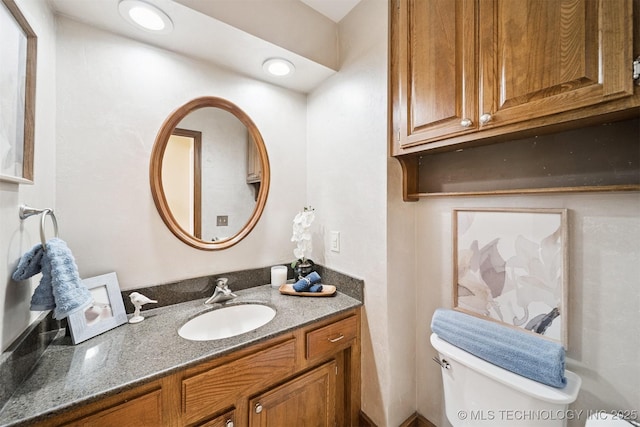 10958 S Richmond Ave, Tulsa, OK 74137 - bathroom featuring toilet and vanity