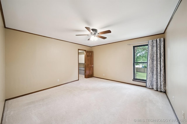 10958 S Richmond Ave, Tulsa, OK 74137 - spare room featuring ceiling fan, light colored carpet, and crown molding
