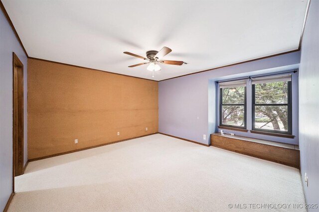 10958 S Richmond Ave, Tulsa, OK 74137 - spare room with carpet floors, ceiling fan, and ornamental molding