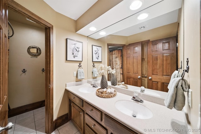 10958 S Richmond Ave, Tulsa, OK 74137 - full bath with double vanity and tile patterned flooring