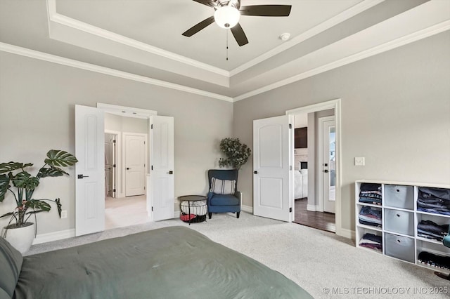 14505 E 79th St, Owasso, OK 74055 - carpeted bedroom with a raised ceiling, crown molding, and a ceiling fan