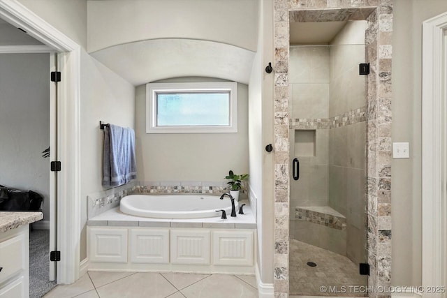 14505 E 79th St, Owasso, OK 74055 - full bath with a bath, a stall shower, and tile patterned flooring