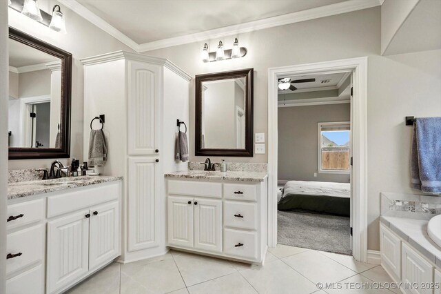 14505 E 79th St, Owasso, OK 74055 - ensuite bathroom featuring tile patterned floors, two vanities, crown molding, ceiling fan, and a bath