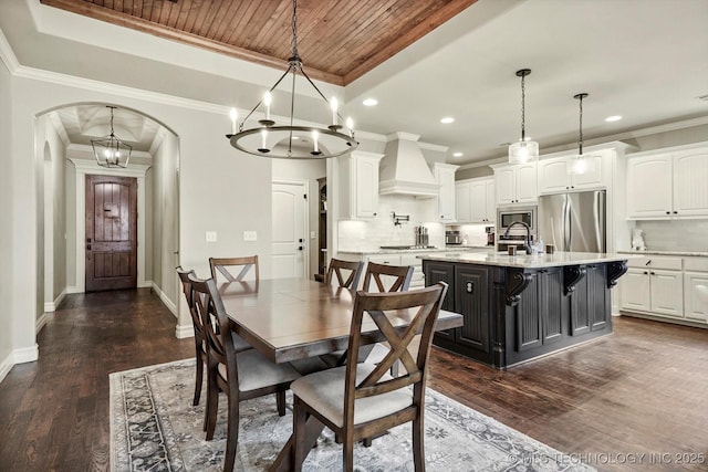 14505 E 79th St, Owasso, OK 74055 - dining room featuring recessed lighting, wooden ceiling, a chandelier, arched walkways, and dark wood-style floors