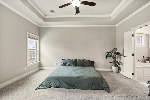 14505 E 79th St, Owasso, OK 74055 - bedroom featuring a tray ceiling, carpet, ornamental molding, and ceiling fan