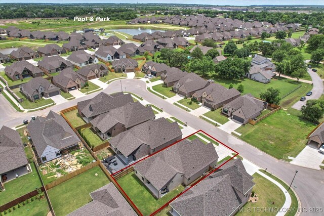 14505 E 79th St, Owasso, OK 74055 - aerial view of residential area featuring a nearby body of water and property parcel outlined