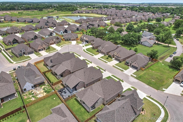 14505 E 79th St, Owasso, OK 74055 - aerial view of property's location with nearby suburban area and a nearby body of water