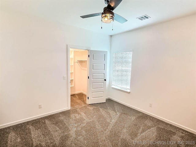 5657 E 141st Pl N, Collinsville, OK 74021 - carpeted spare room featuring ceiling fan and baseboards
