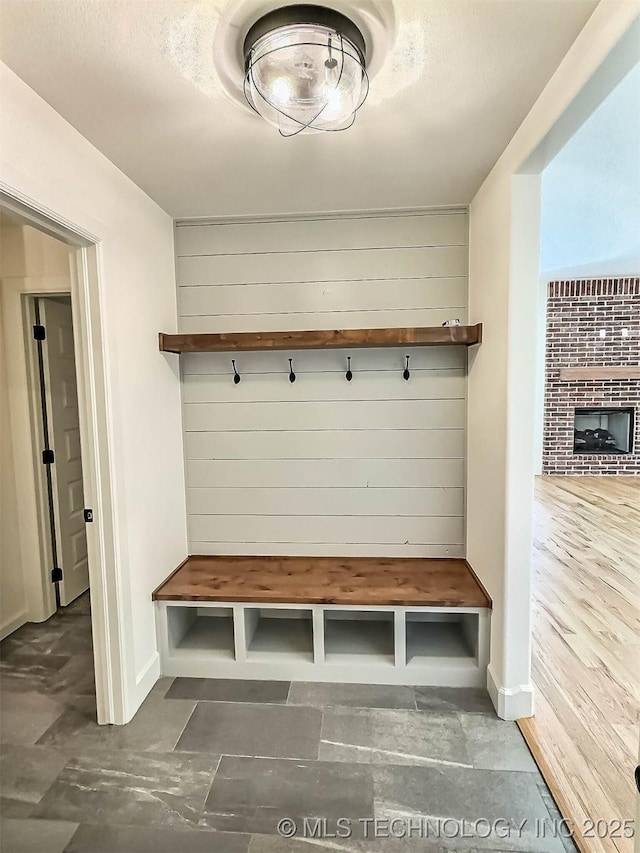 5657 E 141st Pl N, Collinsville, OK 74021 - mudroom with wooden walls and baseboards