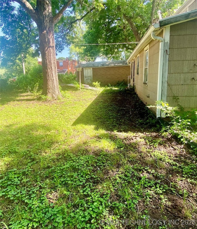 103 S Dunlap St, Cleveland, OK 74020 - view of green lawn
