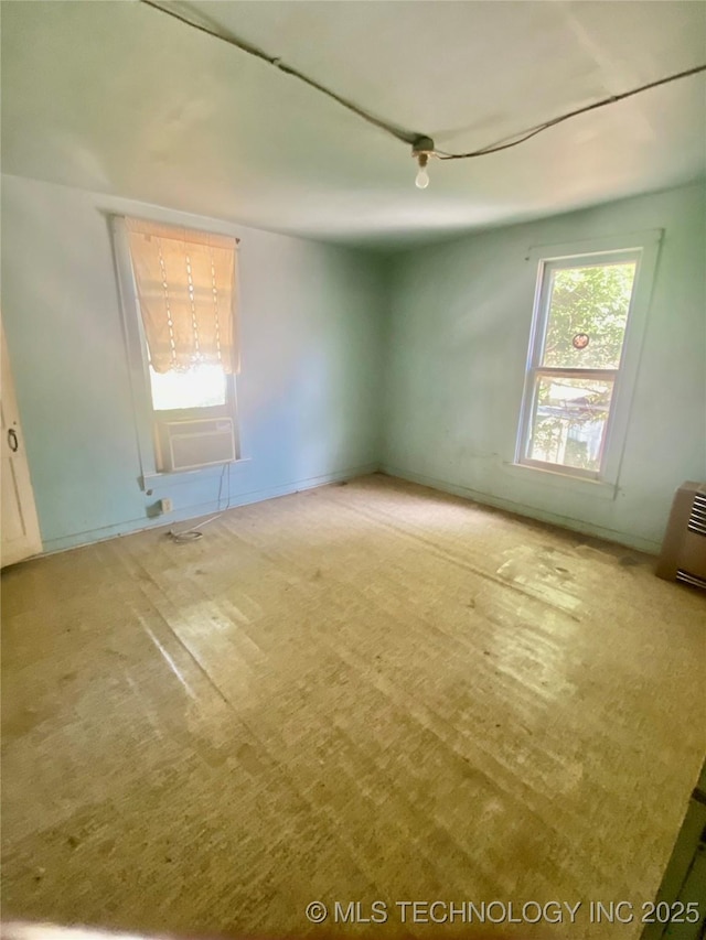 103 S Dunlap St, Cleveland, OK 74020 - spare room featuring cooling unit