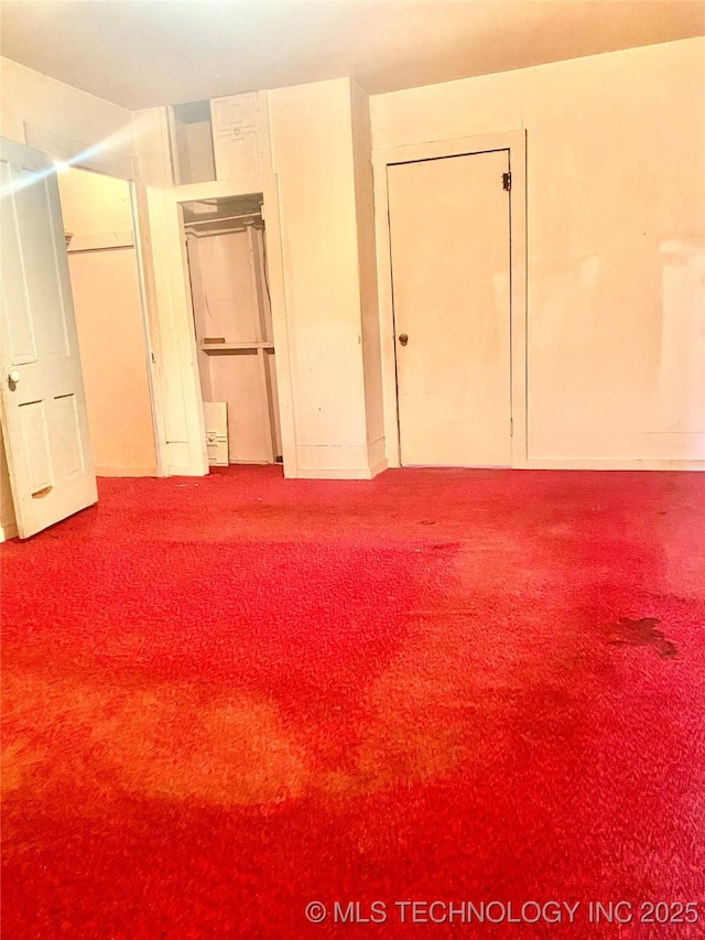103 S Dunlap St, Cleveland, OK 74020 - unfurnished bedroom with carpet flooring