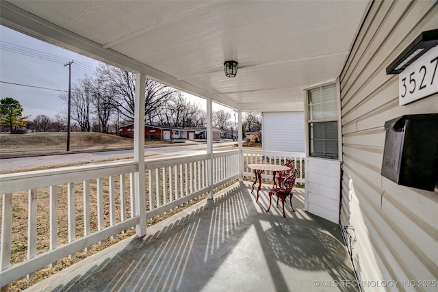 3527 E 4th Pl, Tulsa, OK 74112 - view of wooden porch