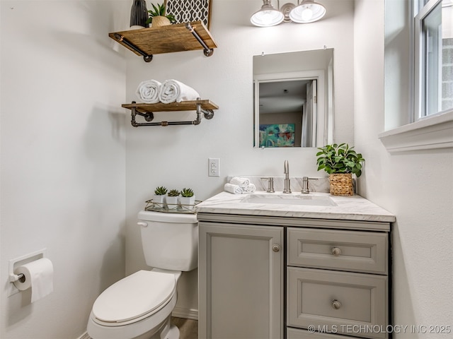 3609 Dana Dr, Bartlesville, OK 74006 - half bathroom with vanity and toilet