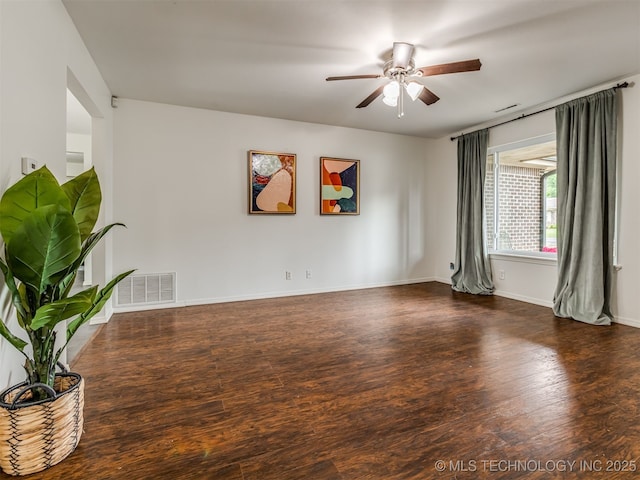 3609 Dana Dr, Bartlesville, OK 74006 - spare room with ceiling fan and wood finished floors