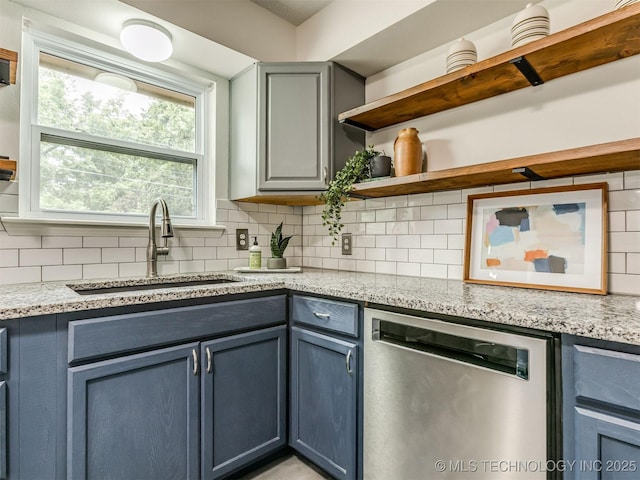 3609 Dana Dr, Bartlesville, OK 74006 - kitchen featuring dishwasher, open shelves, tasteful backsplash, and light stone counters