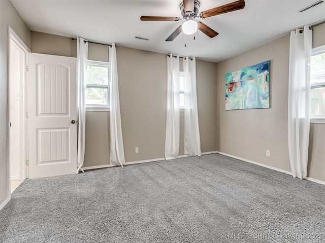 3609 Dana Dr, Bartlesville, OK 74006 - unfurnished room featuring a ceiling fan and carpet floors
