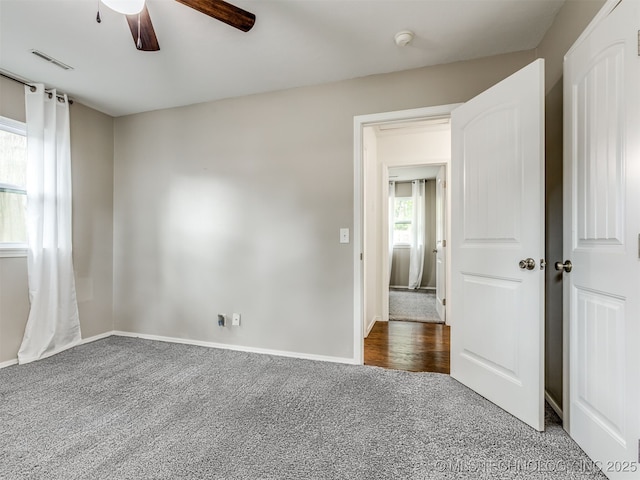 3609 Dana Dr, Bartlesville, OK 74006 - carpeted spare room with ceiling fan and baseboards
