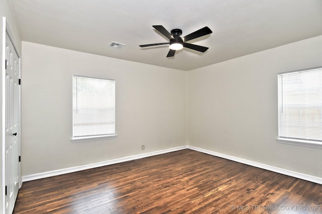 4636 E Independence St, Tulsa, OK 74115 - empty room featuring ceiling fan and dark wood finished floors