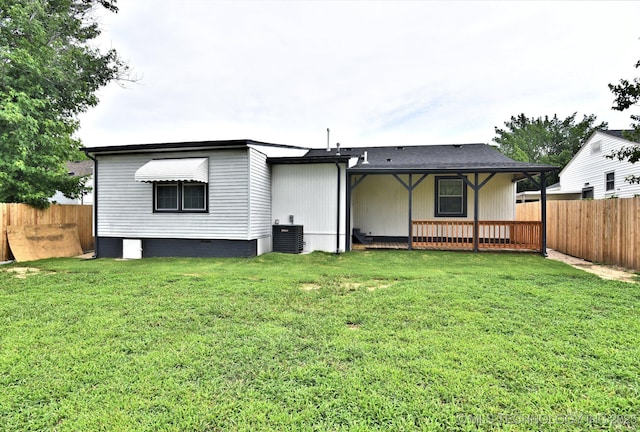 4636 E Independence St, Tulsa, OK 74115 - rear view of property with a fenced backyard