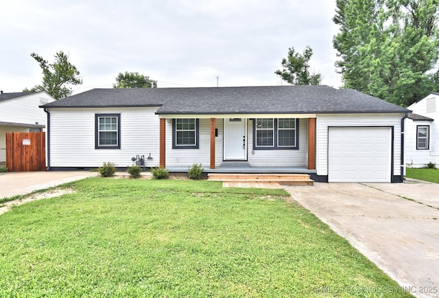 4636 E Independence St, Tulsa, OK 74115 - ranch-style home with a porch, an attached garage, driveway, and roof with shingles