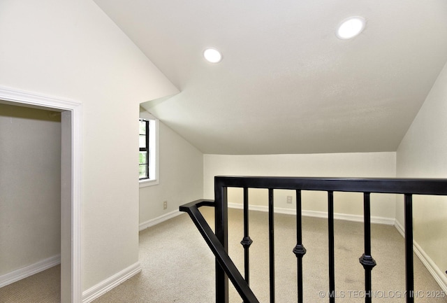 4636 E Independence St, Tulsa, OK 74115 - staircase with carpet, lofted ceiling, and recessed lighting