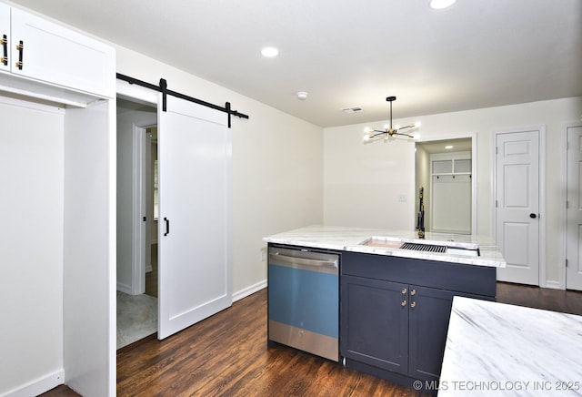 4636 E Independence St, Tulsa, OK 74115 - kitchen with stainless steel dishwasher, a barn door, a chandelier, light stone counters, and recessed lighting