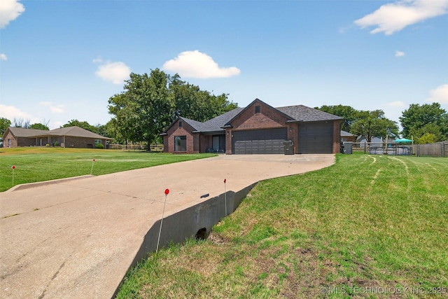 8813 E 104th Pl N, Owasso, OK 74055 - ranch-style house featuring an attached garage, brick siding, and driveway