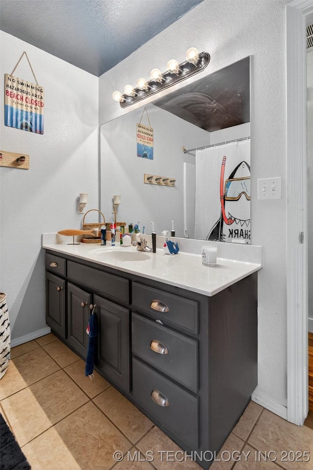 8813 E 104th Pl N, Owasso, OK 74055 - full bathroom featuring vanity and tile patterned flooring