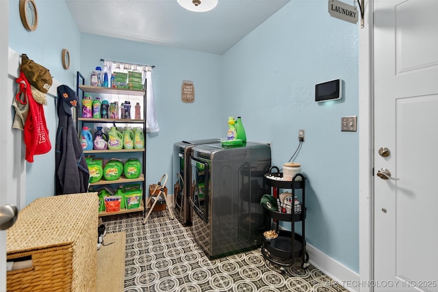 8813 E 104th Pl N, Owasso, OK 74055 - laundry area featuring washing machine and clothes dryer and baseboards
