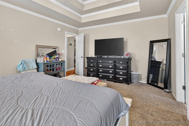 8813 E 104th Pl N, Owasso, OK 74055 - carpeted bedroom with crown molding and a tray ceiling