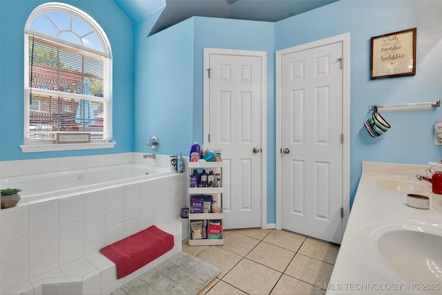 8813 E 104th Pl N, Owasso, OK 74055 - bathroom with tile patterned floors, a bath, and double vanity