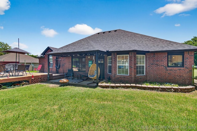 8813 E 104th Pl N, Owasso, OK 74055 - view of front of property with roof with shingles, brick siding, a front lawn, and a deck