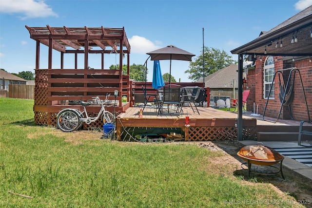 8813 E 104th Pl N, Owasso, OK 74055 - wooden deck with a fire pit, a yard, and a pergola