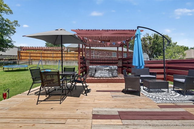 8813 E 104th Pl N, Owasso, OK 74055 - wooden terrace with a trampoline, a pergola, outdoor dining area, and a hot tub