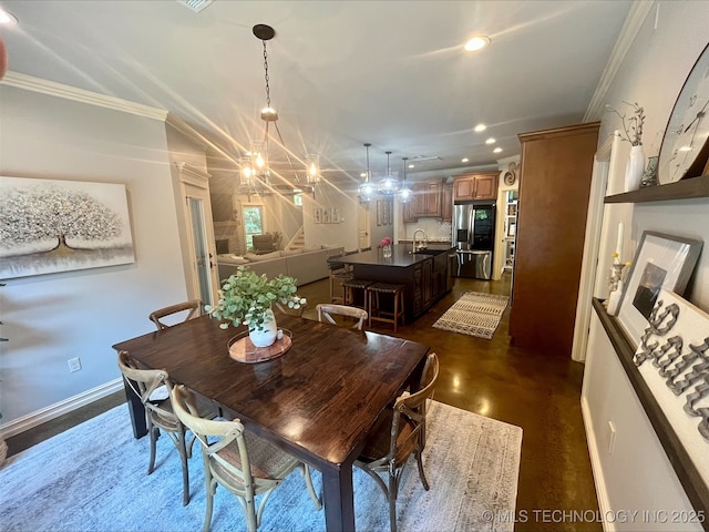 239 E 117th St S, Jenks, OK 74037 - dining room featuring crown molding, recessed lighting, and a chandelier